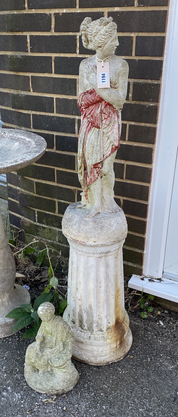 A reconstituted stone classical figure on a pedestal, height 114cm, and another smaller ornament